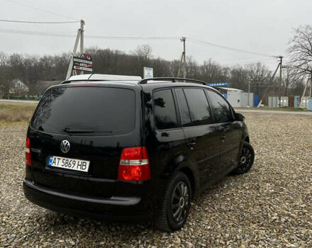 Черный Фольксваген Туран, объемом двигателя 1.6 л и пробегом 208 тыс. км за 5700 $, фото 12 на Automoto.ua