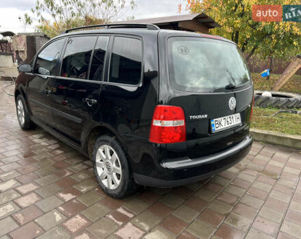 Черный Фольксваген Туран, объемом двигателя 1.6 л и пробегом 271 тыс. км за 5500 $, фото 6 на Automoto.ua