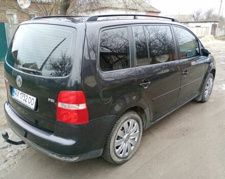 Черный Фольксваген Туран, объемом двигателя 1.6 л и пробегом 220 тыс. км за 6300 $, фото 4 на Automoto.ua