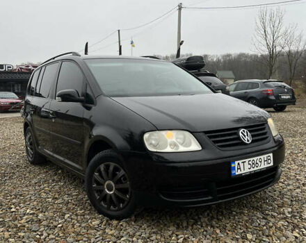 Черный Фольксваген Туран, объемом двигателя 1.6 л и пробегом 208 тыс. км за 5700 $, фото 6 на Automoto.ua