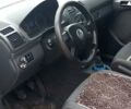 Черный Фольксваген Туран, объемом двигателя 1.6 л и пробегом 260 тыс. км за 5600 $, фото 1 на Automoto.ua