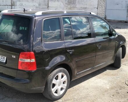 Черный Фольксваген Туран, объемом двигателя 2 л и пробегом 260 тыс. км за 6500 $, фото 3 на Automoto.ua