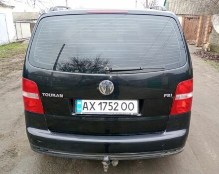 Черный Фольксваген Туран, объемом двигателя 1.6 л и пробегом 220 тыс. км за 6300 $, фото 5 на Automoto.ua