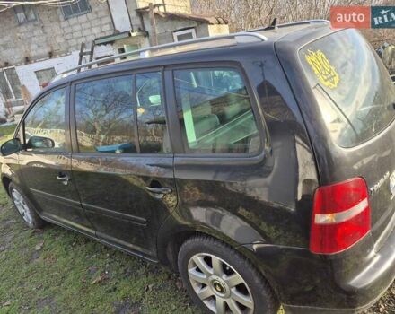 Черный Фольксваген Туран, объемом двигателя 1.9 л и пробегом 352 тыс. км за 4500 $, фото 5 на Automoto.ua