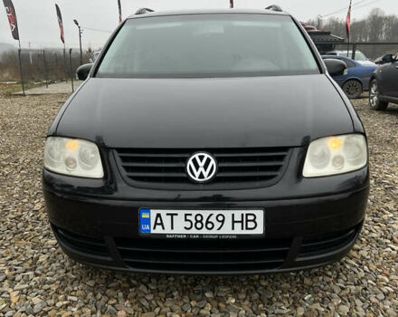 Черный Фольксваген Туран, объемом двигателя 1.6 л и пробегом 208 тыс. км за 5700 $, фото 3 на Automoto.ua