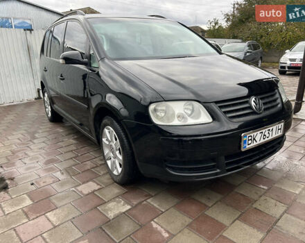 Черный Фольксваген Туран, объемом двигателя 1.6 л и пробегом 271 тыс. км за 5500 $, фото 13 на Automoto.ua