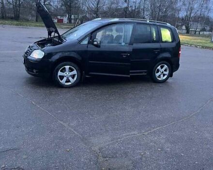 Черный Фольксваген Туран, объемом двигателя 1.97 л и пробегом 293 тыс. км за 5900 $, фото 18 на Automoto.ua