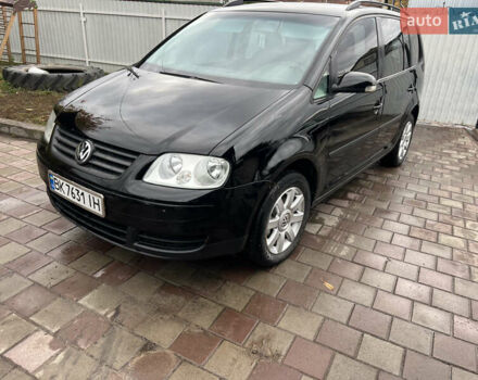 Черный Фольксваген Туран, объемом двигателя 1.6 л и пробегом 271 тыс. км за 5500 $, фото 11 на Automoto.ua