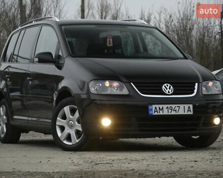 Чорний Фольксваген Туран, об'ємом двигуна 2 л та пробігом 267 тис. км за 5999 $, фото 1 на Automoto.ua