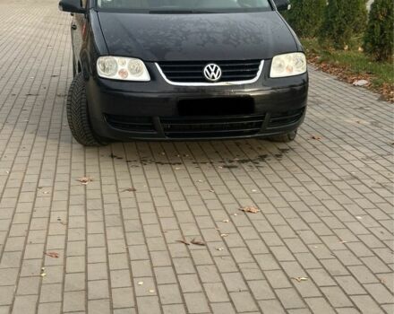 Чорний Фольксваген Туран, об'ємом двигуна 2 л та пробігом 300 тис. км за 2500 $, фото 3 на Automoto.ua