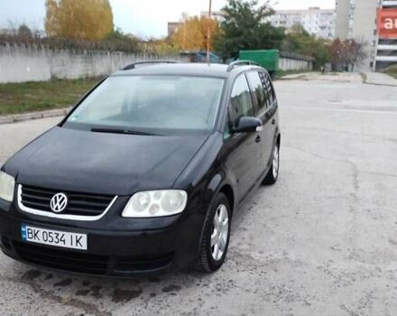 Чорний Фольксваген Туран, об'ємом двигуна 1.6 л та пробігом 249 тис. км за 5500 $, фото 14 на Automoto.ua