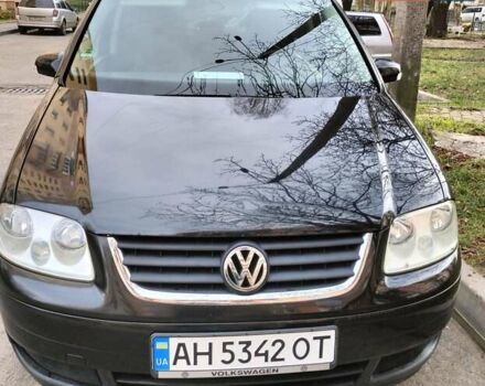 Черный Фольксваген Туран, объемом двигателя 1.6 л и пробегом 202 тыс. км за 5300 $, фото 2 на Automoto.ua