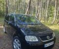 Чорний Фольксваген Туран, об'ємом двигуна 1.97 л та пробігом 330 тис. км за 5600 $, фото 1 на Automoto.ua