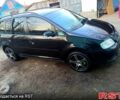 Черный Фольксваген Туран, объемом двигателя 1.6 л и пробегом 250 тыс. км за 5300 $, фото 1 на Automoto.ua