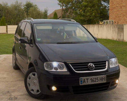 Черный Фольксваген Туран, объемом двигателя 1.6 л и пробегом 218 тыс. км за 5900 $, фото 6 на Automoto.ua