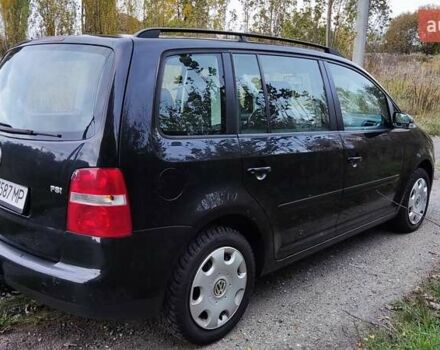 Черный Фольксваген Туран, объемом двигателя 1.6 л и пробегом 225 тыс. км за 5700 $, фото 13 на Automoto.ua
