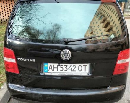Черный Фольксваген Туран, объемом двигателя 1.6 л и пробегом 202 тыс. км за 5300 $, фото 6 на Automoto.ua