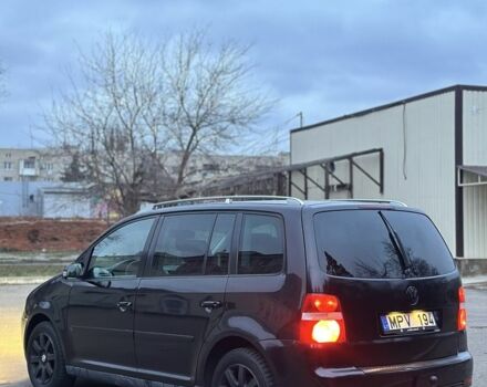 Черный Фольксваген Туран, объемом двигателя 2 л и пробегом 420 тыс. км за 3400 $, фото 5 на Automoto.ua