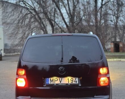 Черный Фольксваген Туран, объемом двигателя 2 л и пробегом 420 тыс. км за 3400 $, фото 4 на Automoto.ua