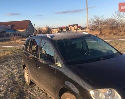 Черный Фольксваген Туран, объемом двигателя 1.97 л и пробегом 347 тыс. км за 5300 $, фото 3 на Automoto.ua