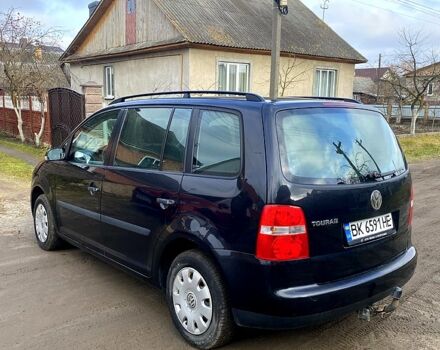 Чорний Фольксваген Туран, об'ємом двигуна 1.6 л та пробігом 205 тис. км за 5200 $, фото 1 на Automoto.ua