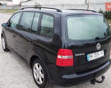 Чорний Фольксваген Туран, об'ємом двигуна 1.6 л та пробігом 249 тис. км за 5500 $, фото 1 на Automoto.ua