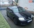 Чорний Фольксваген Туран, об'ємом двигуна 1.6 л та пробігом 252 тис. км за 5400 $, фото 1 на Automoto.ua