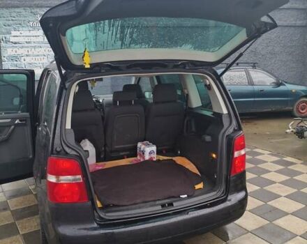 Чорний Фольксваген Туран, об'ємом двигуна 1.97 л та пробігом 262 тис. км за 6500 $, фото 59 на Automoto.ua