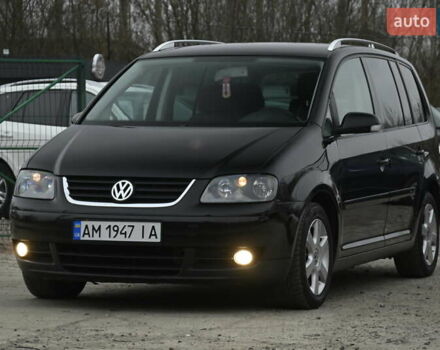 Чорний Фольксваген Туран, об'ємом двигуна 2 л та пробігом 267 тис. км за 5999 $, фото 4 на Automoto.ua