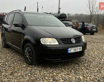 Черный Фольксваген Туран, объемом двигателя 1.6 л и пробегом 208 тыс. км за 5700 $, фото 34 на Automoto.ua