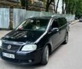 Чорний Фольксваген Туран, об'ємом двигуна 2 л та пробігом 265 тис. км за 6022 $, фото 1 на Automoto.ua