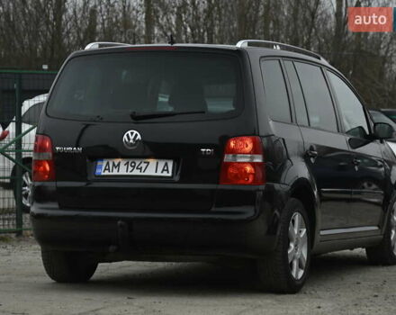 Чорний Фольксваген Туран, об'ємом двигуна 2 л та пробігом 267 тис. км за 5999 $, фото 10 на Automoto.ua