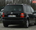 Чорний Фольксваген Туран, об'ємом двигуна 2 л та пробігом 267 тис. км за 5999 $, фото 10 на Automoto.ua