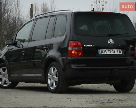 Чорний Фольксваген Туран, об'ємом двигуна 2 л та пробігом 267 тис. км за 5999 $, фото 7 на Automoto.ua
