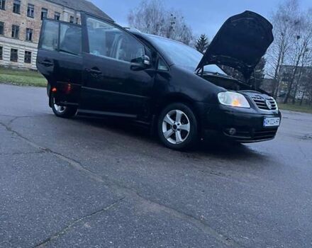 Черный Фольксваген Туран, объемом двигателя 1.97 л и пробегом 293 тыс. км за 5900 $, фото 19 на Automoto.ua