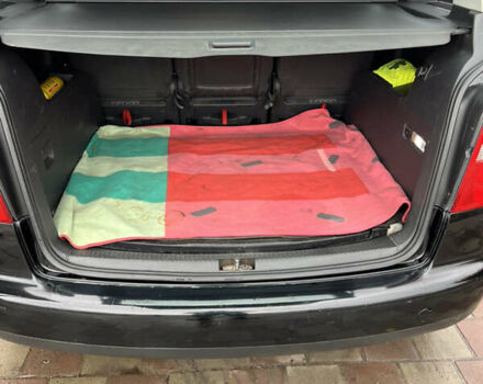 Черный Фольксваген Туран, объемом двигателя 1.6 л и пробегом 271 тыс. км за 5500 $, фото 2 на Automoto.ua