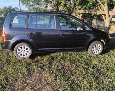 Черный Фольксваген Туран, объемом двигателя 1.6 л и пробегом 250 тыс. км за 5000 $, фото 2 на Automoto.ua