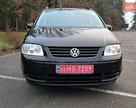 Черный Фольксваген Туран, объемом двигателя 1.6 л и пробегом 240 тыс. км за 5700 $, фото 2 на Automoto.ua