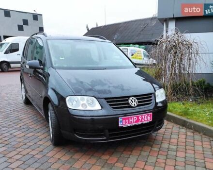 Черный Фольксваген Туран, объемом двигателя 1.6 л и пробегом 237 тыс. км за 5250 $, фото 3 на Automoto.ua