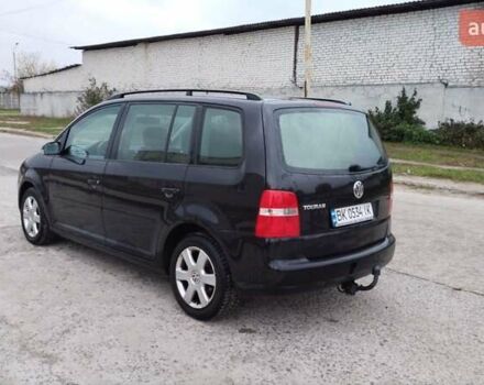 Чорний Фольксваген Туран, об'ємом двигуна 1.6 л та пробігом 249 тис. км за 5500 $, фото 6 на Automoto.ua