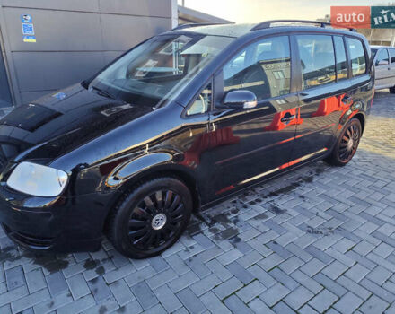 Черный Фольксваген Туран, объемом двигателя 1.6 л и пробегом 219 тыс. км за 5850 $, фото 6 на Automoto.ua