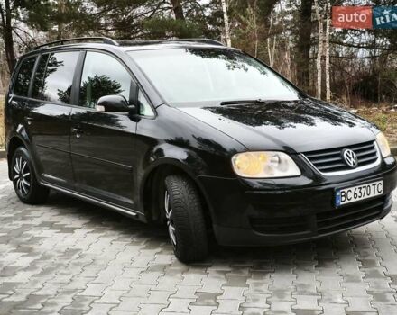 Черный Фольксваген Туран, объемом двигателя 2 л и пробегом 321 тыс. км за 5500 $, фото 3 на Automoto.ua