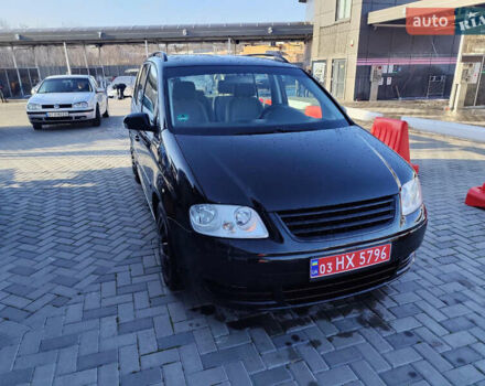 Черный Фольксваген Туран, объемом двигателя 1.6 л и пробегом 219 тыс. км за 5850 $, фото 4 на Automoto.ua