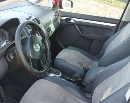 Черный Фольксваген Туран, объемом двигателя 2 л и пробегом 290 тыс. км за 6000 $, фото 4 на Automoto.ua