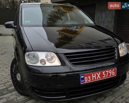 Черный Фольксваген Туран, объемом двигателя 1.6 л и пробегом 219 тыс. км за 5399 $, фото 15 на Automoto.ua