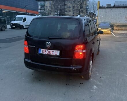 Черный Фольксваген Туран, объемом двигателя 2 л и пробегом 377 тыс. км за 2500 $, фото 2 на Automoto.ua