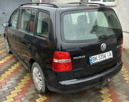 Черный Фольксваген Туран, объемом двигателя 1.97 л и пробегом 316 тыс. км за 5700 $, фото 5 на Automoto.ua