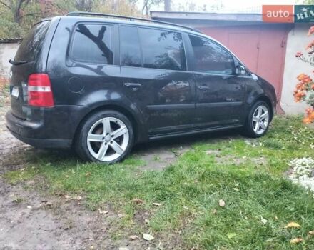 Черный Фольксваген Туран, объемом двигателя 1.9 л и пробегом 334 тыс. км за 5500 $, фото 6 на Automoto.ua