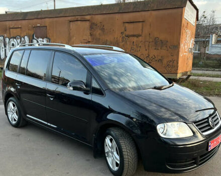 Черный Фольксваген Туран, объемом двигателя 1.6 л и пробегом 229 тыс. км за 6450 $, фото 6 на Automoto.ua