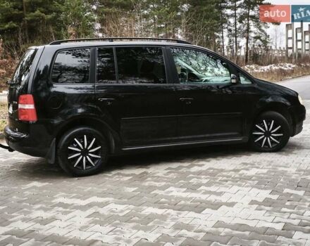 Черный Фольксваген Туран, объемом двигателя 2 л и пробегом 321 тыс. км за 5500 $, фото 4 на Automoto.ua